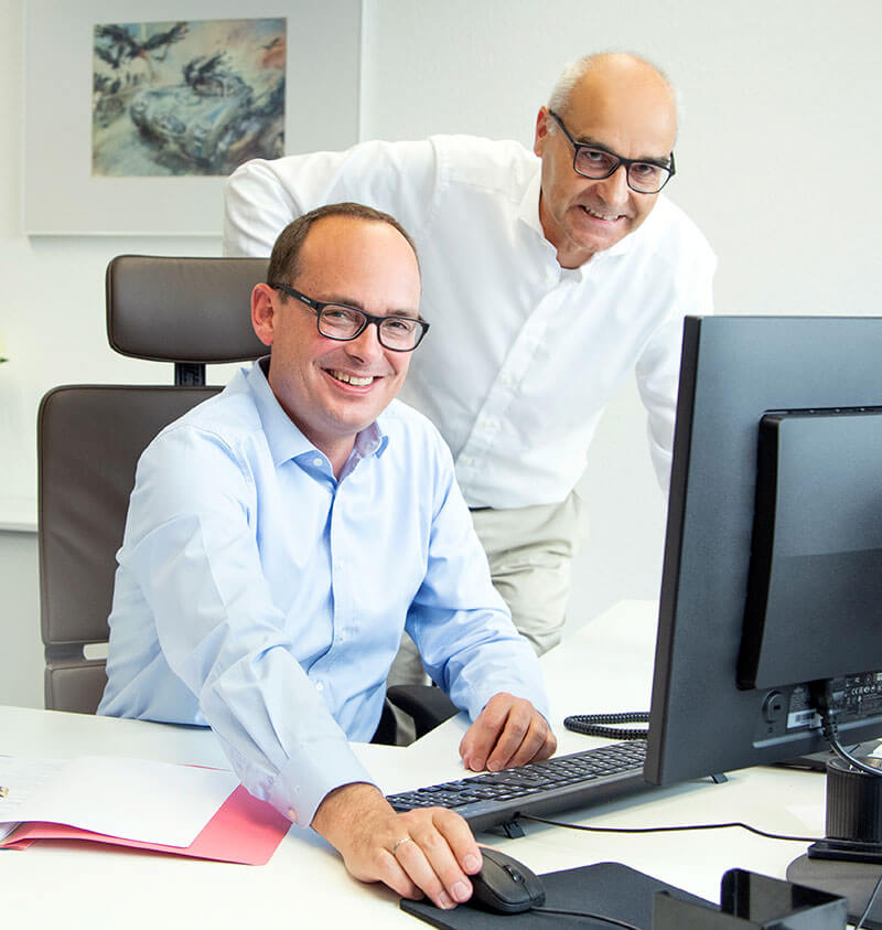 Dr. Trefz und Dr. Flachsbarth Dr. Trefz und Dr. Flachsbarth am Computer